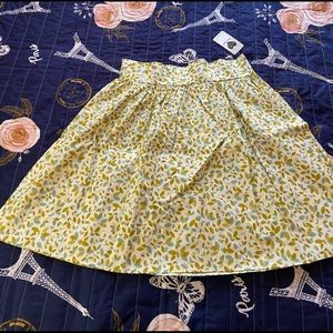 Pinup couture print circle skirt. Never worn new with tags. Pet/smoke free home.